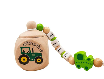 Milchzahndose mit Namen Traktor Grün