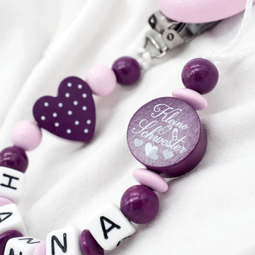 Schnullerkette mit Namen Mädchen kleine Schwester + Herz lila rosa