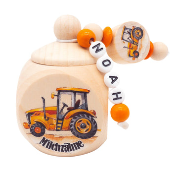 Milchzahndose mit Namen Bagger Traktor Orange